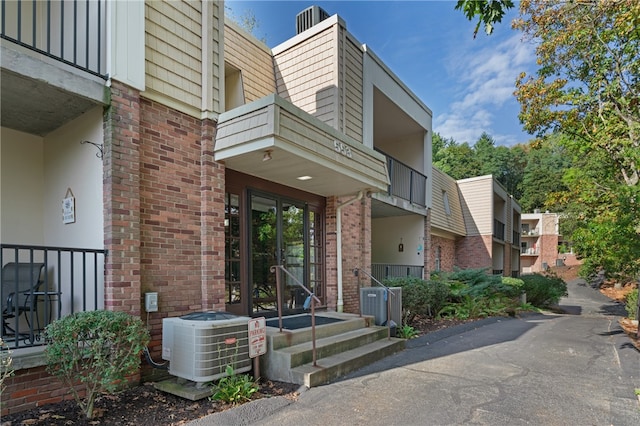 view of property with central air condition unit