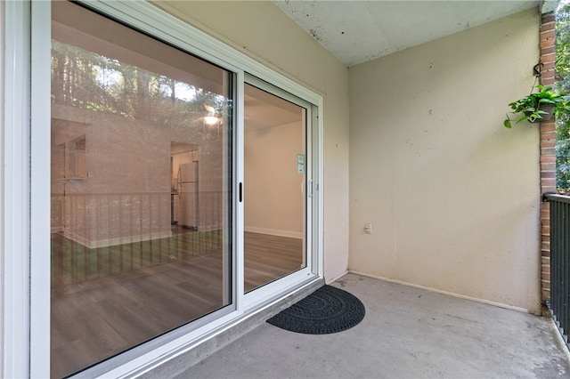 doorway to property featuring a patio