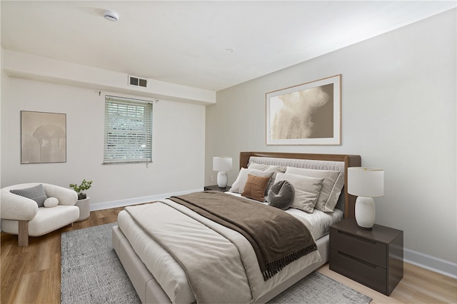 bedroom featuring light hardwood / wood-style flooring