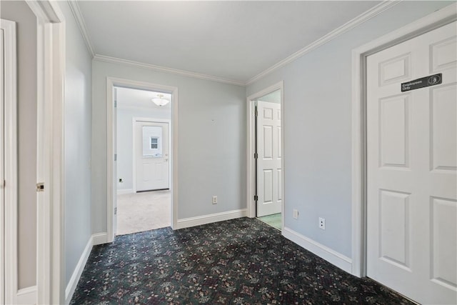 interior space featuring crown molding and carpet floors