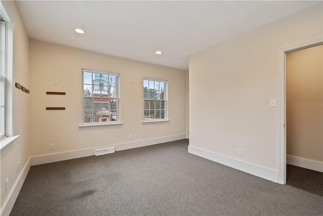 view of carpeted spare room