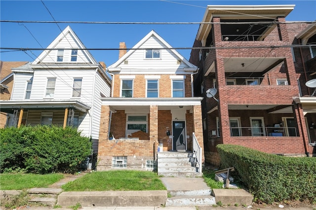 view of property with a balcony