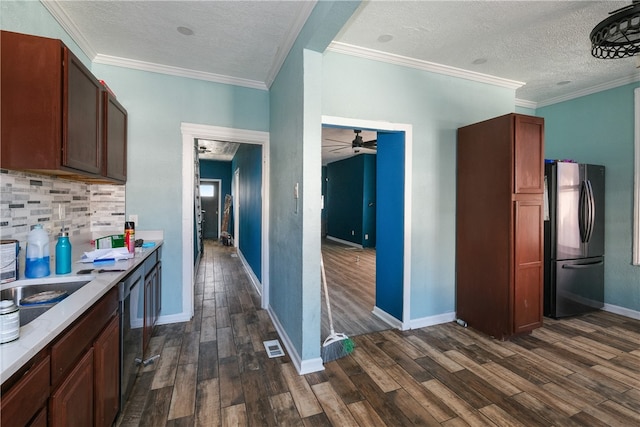 kitchen with ceiling fan, dark hardwood / wood-style floors, black appliances, ornamental molding, and a textured ceiling