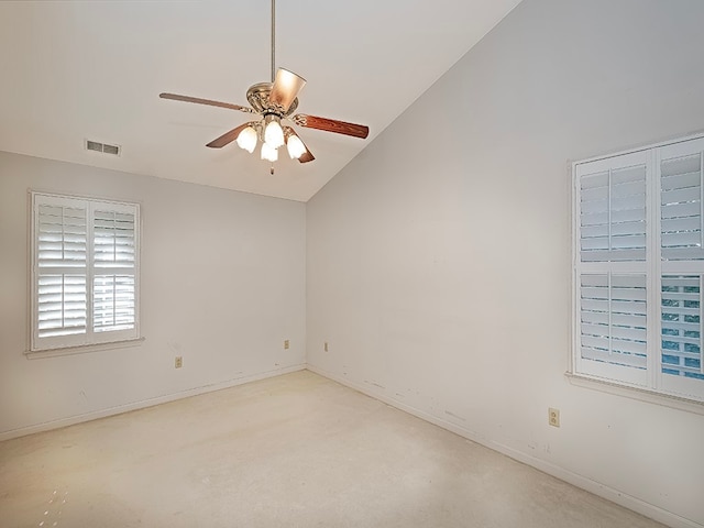 unfurnished room with high vaulted ceiling, ceiling fan, and light colored carpet