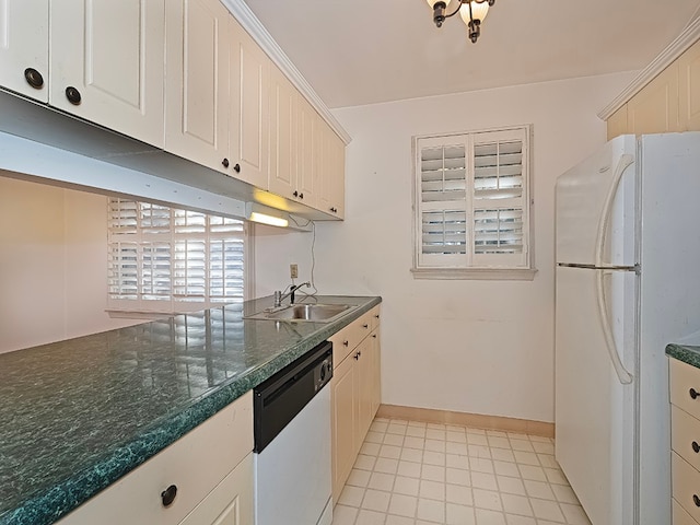 kitchen with white appliances, sink, and light tile patterned floors