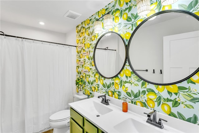 bathroom featuring a shower with curtain, vanity, and toilet