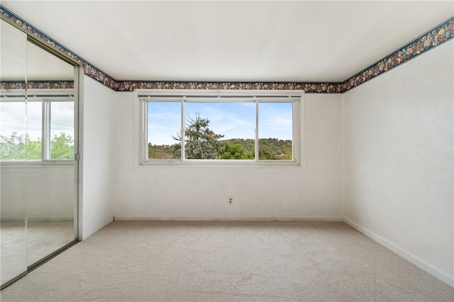 view of carpeted spare room