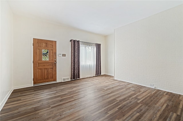 entrance foyer featuring dark wood-type flooring