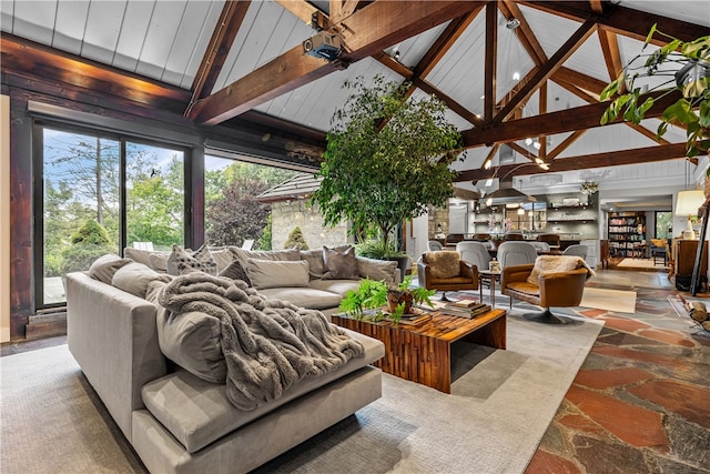 interior space featuring vaulted ceiling with beams