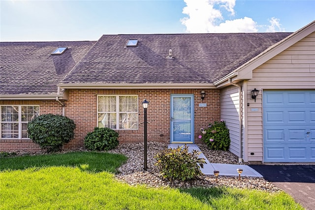 doorway to property featuring a garage