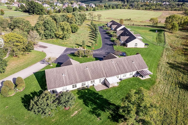 birds eye view of property featuring a rural view