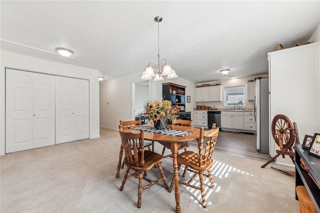 carpeted dining room featuring an inviting chandelier