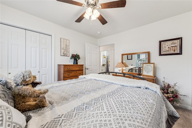 bedroom with ceiling fan, a closet, and carpet