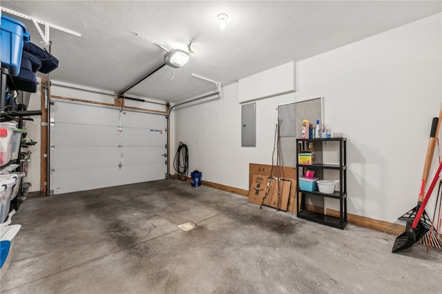 garage featuring a garage door opener and electric panel