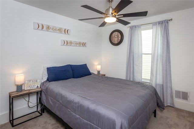 carpeted bedroom featuring ceiling fan