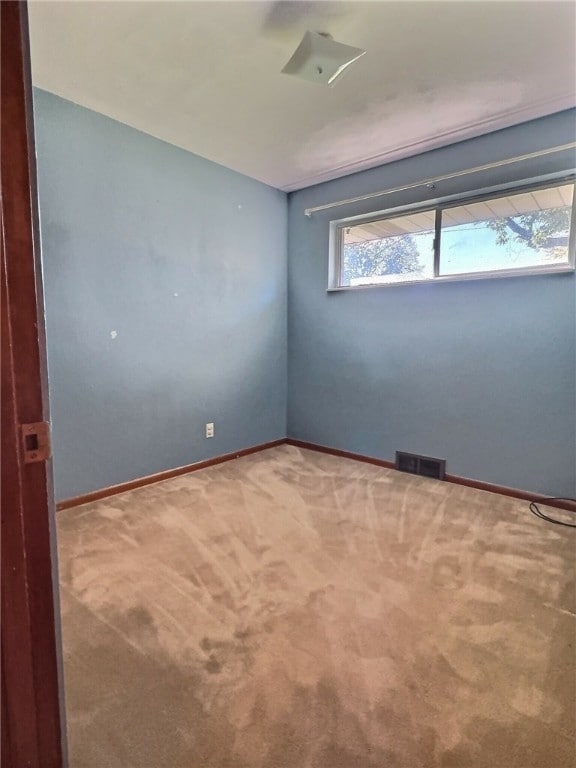 empty room with carpet floors