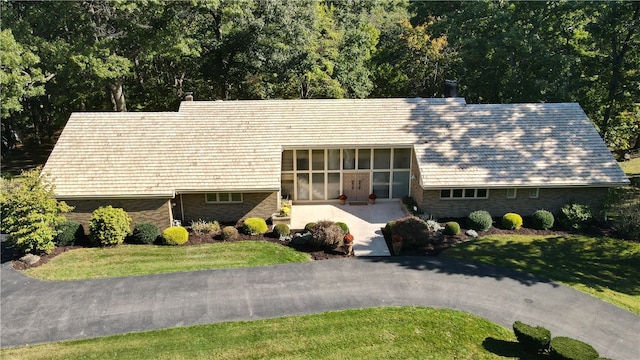 view of front of home with a front yard