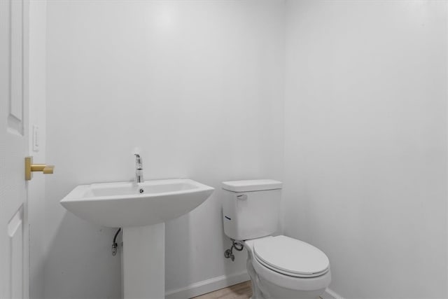 bathroom featuring toilet