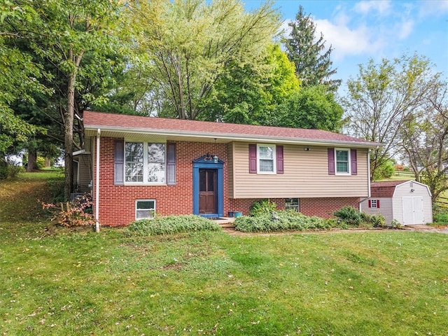 bi-level home with a storage unit and a front yard