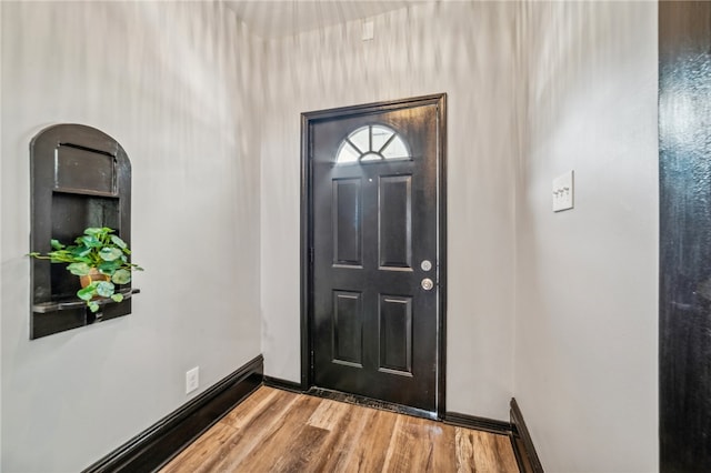 entrance foyer featuring hardwood / wood-style floors