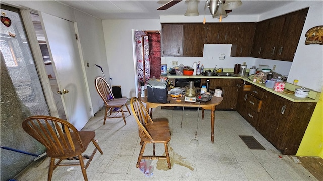 kitchen featuring dishwasher, dark brown cabinets, and ceiling fan