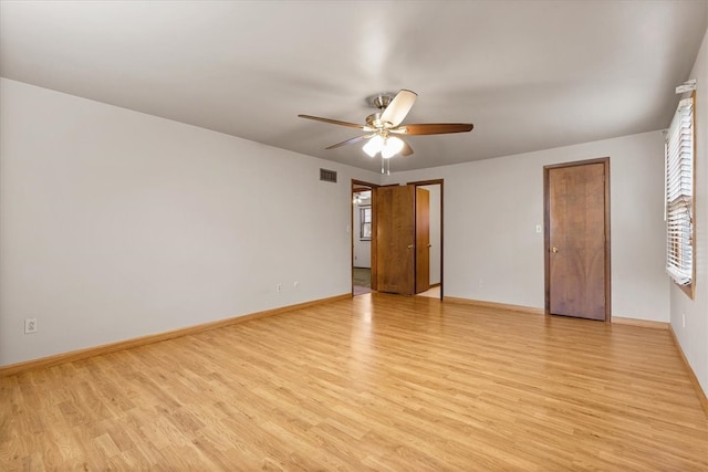 unfurnished bedroom with ceiling fan and light hardwood / wood-style floors