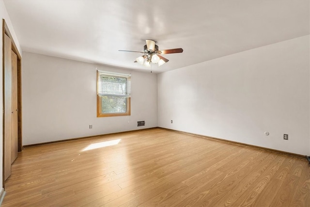 unfurnished bedroom with ceiling fan and light hardwood / wood-style flooring