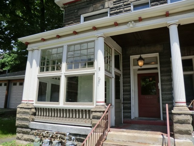 entrance to property featuring a garage