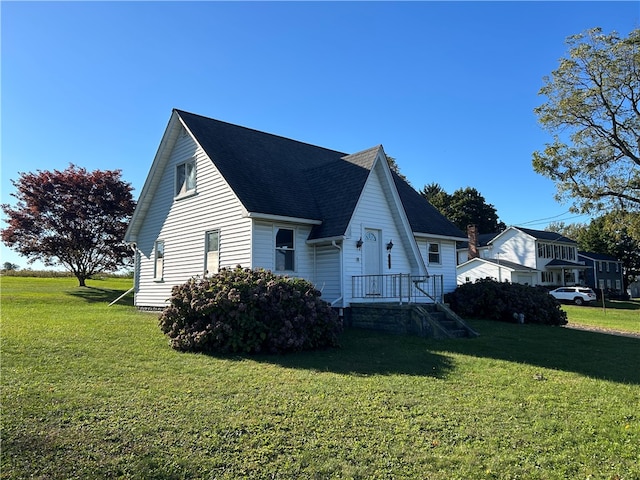 view of property exterior with a lawn