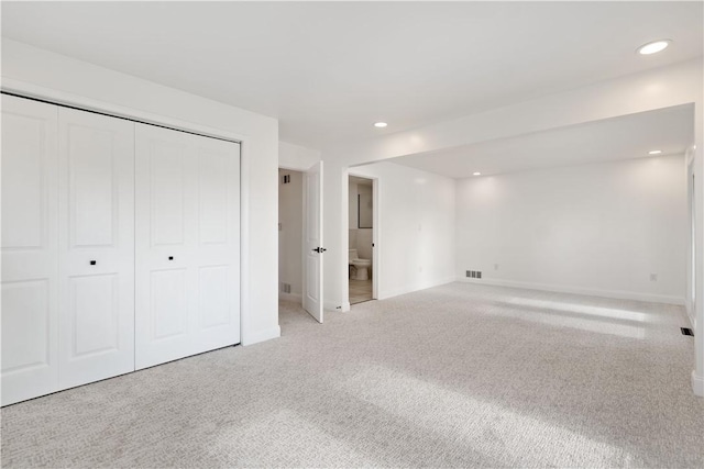 1205 Curry Rd, Sewickley Twp, PA 15083 - unfurnished bedroom featuring light colored carpet, baseboards, recessed lighting, and a closet