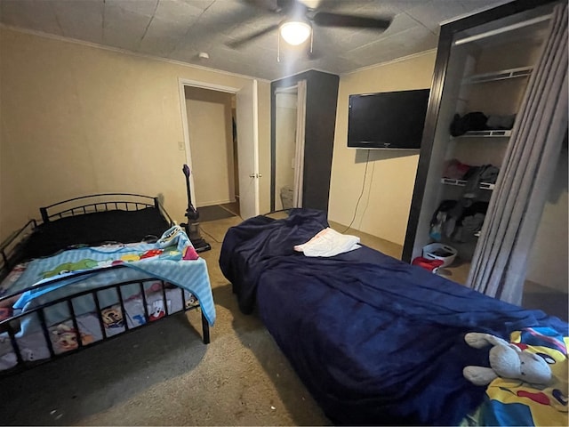 bedroom with ornamental molding and ceiling fan