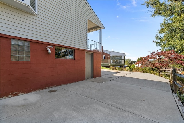 view of home's exterior featuring a balcony