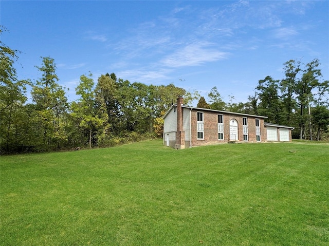 exterior space featuring a yard