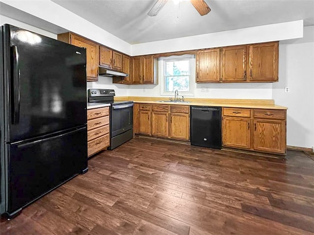 kitchen featuring ceiling fan, sink, dark wood-type flooring, and black appliances