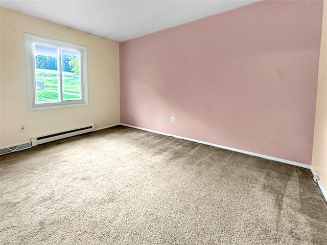 empty room with carpet and a baseboard radiator