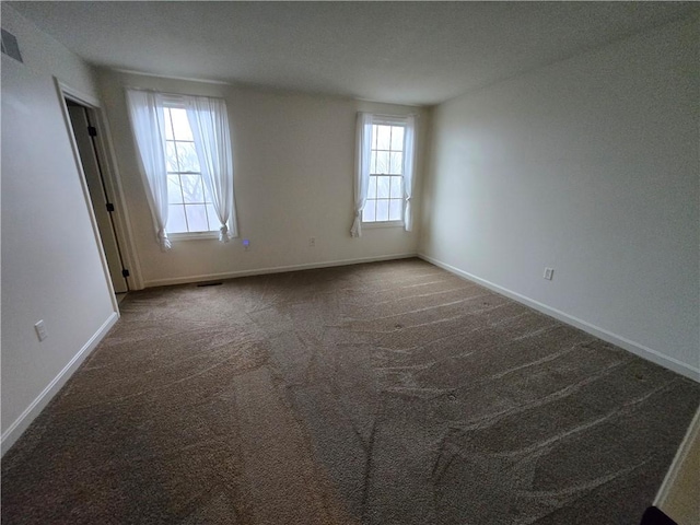 view of carpeted spare room