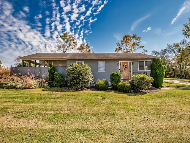 ranch-style house with a front lawn