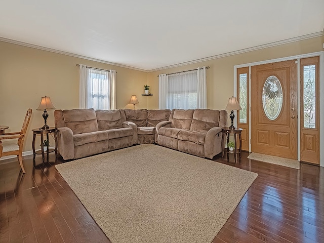 living room with dark wood-type flooring and ornamental molding