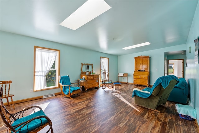 living area with dark hardwood / wood-style floors