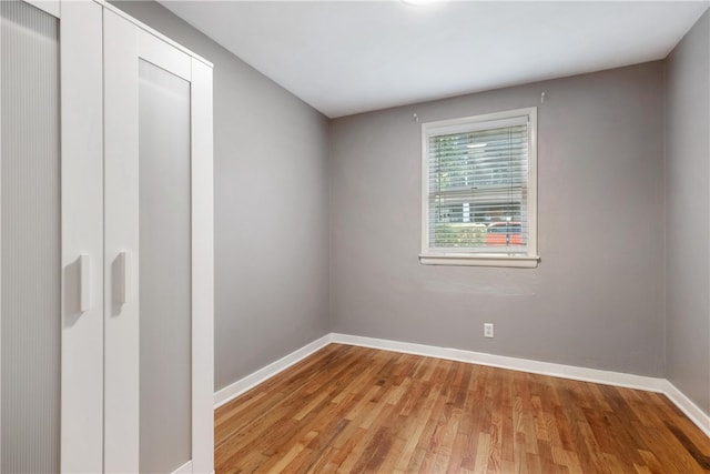 empty room with light wood-type flooring