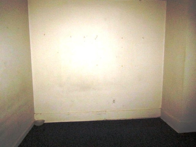 empty room with baseboards