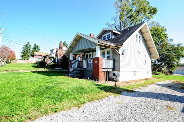 view of home's exterior with a yard