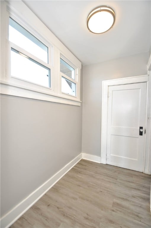 empty room with light wood-type flooring