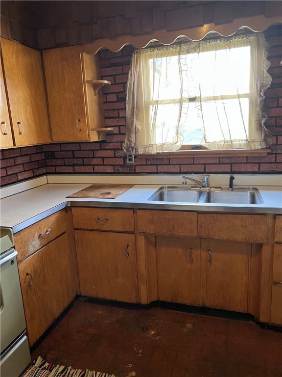 kitchen with sink and stainless steel range