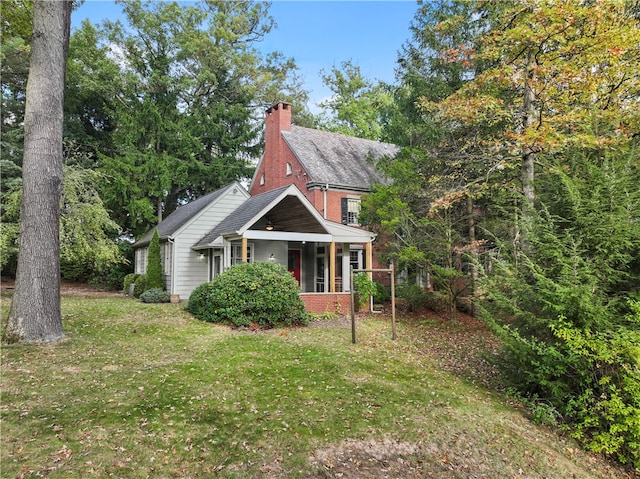 view of property exterior featuring a lawn