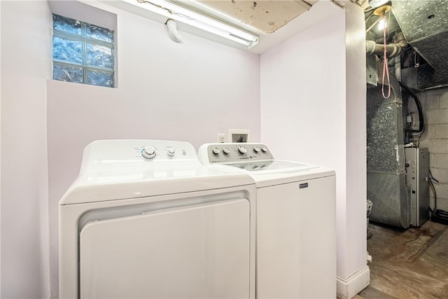 laundry room featuring washer and clothes dryer