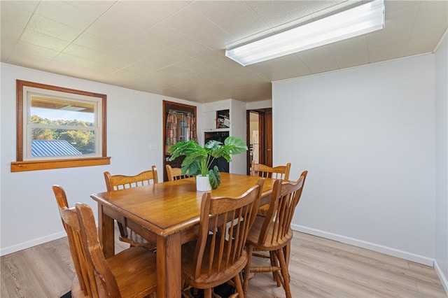 dining room featuring light hardwood / wood-style floors