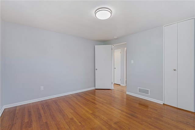 empty room with light wood-type flooring