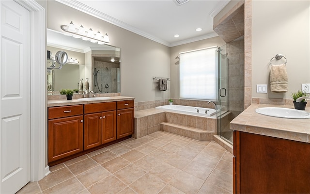 bathroom featuring tile patterned floors, crown molding, vanity, and independent shower and bath