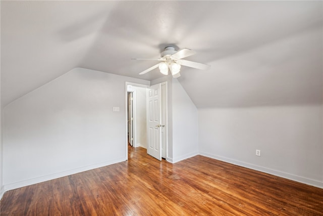 additional living space featuring ceiling fan, hardwood / wood-style flooring, and lofted ceiling